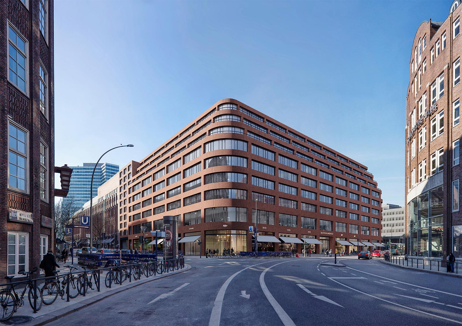Das Deutschlandhaus in Hamburg erscheint in rotem Klinker und hat abgerundete Ecken.