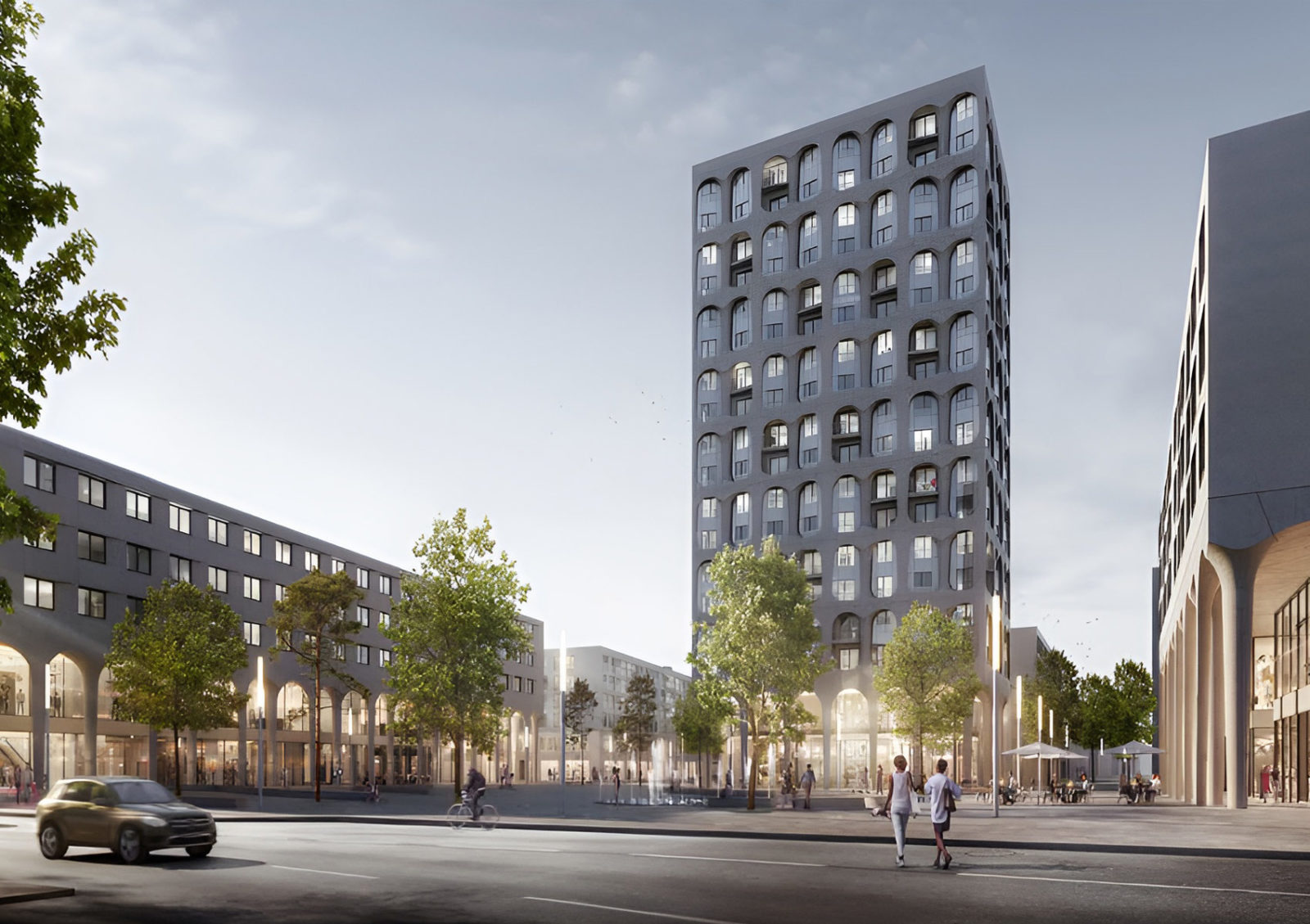 Visualisierung des Stadtteilzentrums Freiham Nord in München. Es besteht aus mehreren Gebäuden. Das auffälligste ist ein Hochhaus mit Glasfassade.