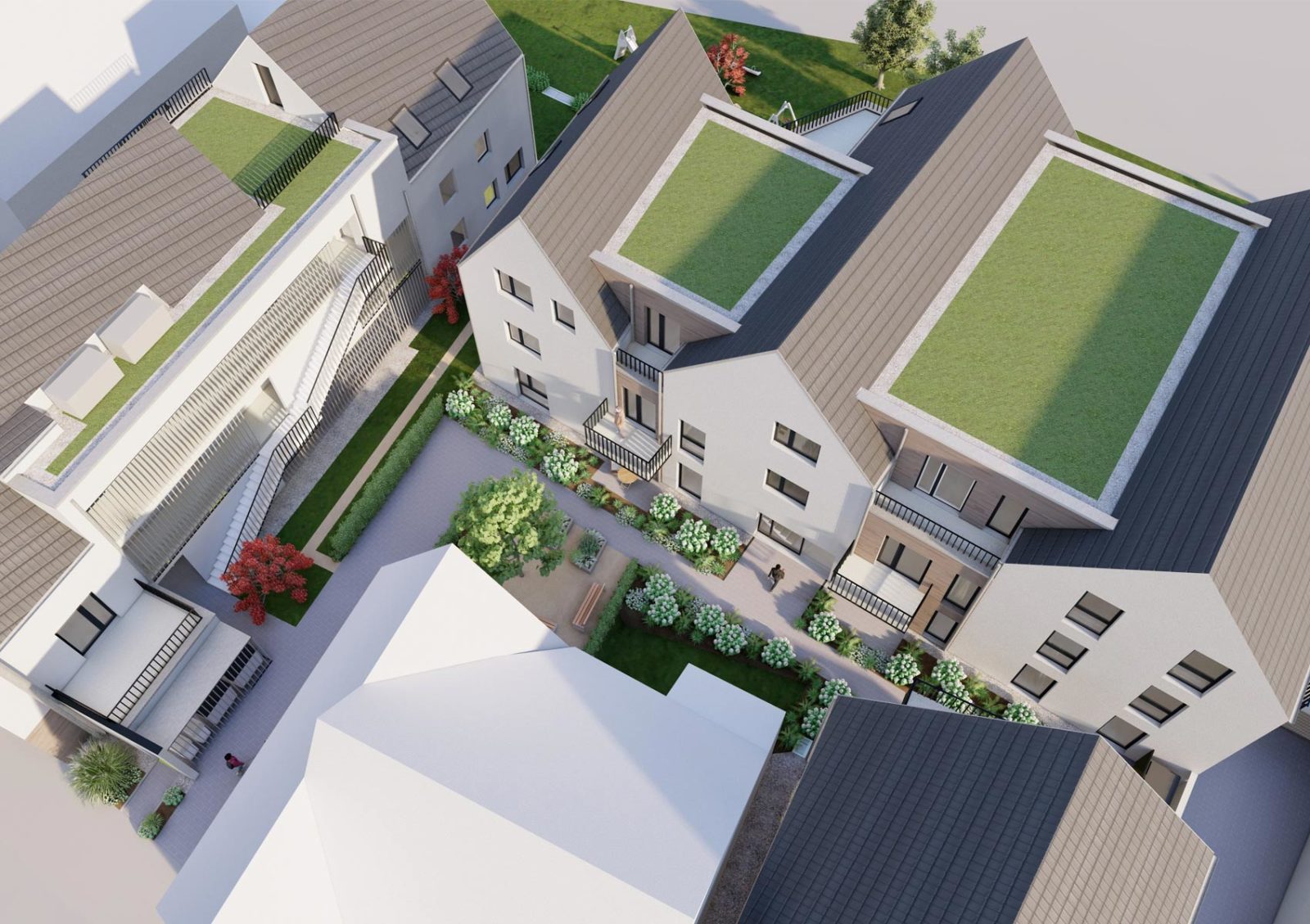 Die Visualisierung zeigt das Wohnquartier Lauffener Hof in Kirchheim am Neckar aus der Vogelperspektive. Mehrere Mehrfamilienhäuser mit Spitzdächern und Dachbegrünung.