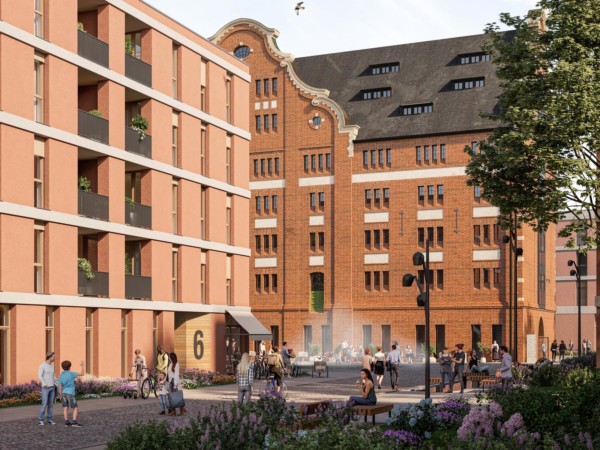 Neubau und sanierter Altbau mit roter Backsteinfassade