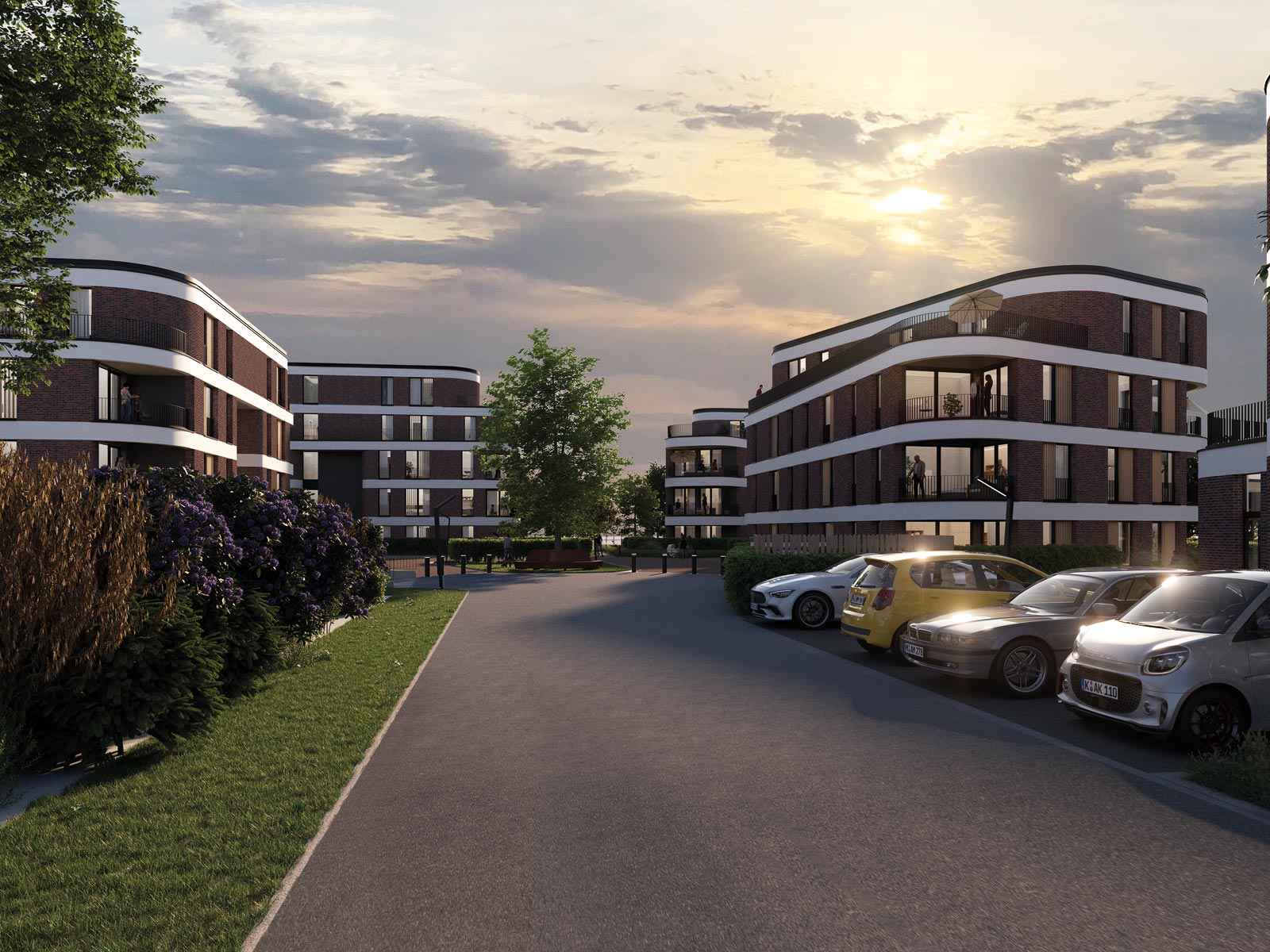 Visualisierung des Neubaus QUIN Quartier in Sehnde. Mehrere abgerundete Mehrfamilienhäuser mit Klinkerfassaden.